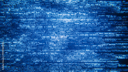 Fotografie Lines of programming code scrolling up on a dark screen background