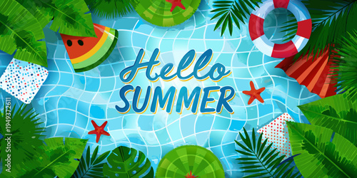 A vibrant summer scene featuring pool floats and tropical foliage