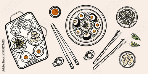 Overhead view of a japanese style meal with sushi sides and chopsticks