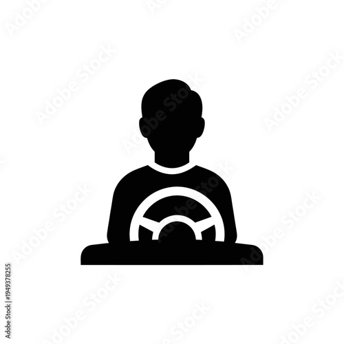 Silhouette of a person steering a vehicle from behind the wheel.