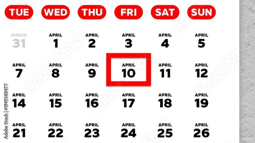 The date April 10th marked with a red cursor on the wall calendar 2026