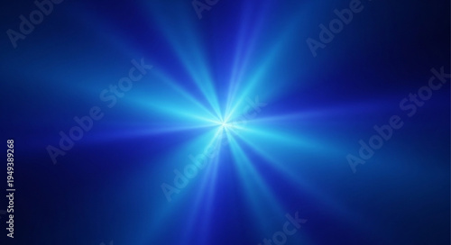 Bright Blue Light Bursting Outwards on Dark Background.