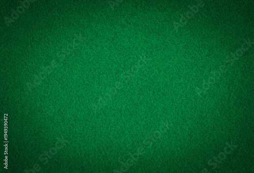Green background poker game table top view - felt fabric texture.