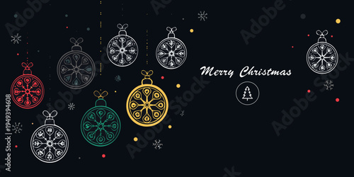 Festive christmas ornaments and greeting with a dark background