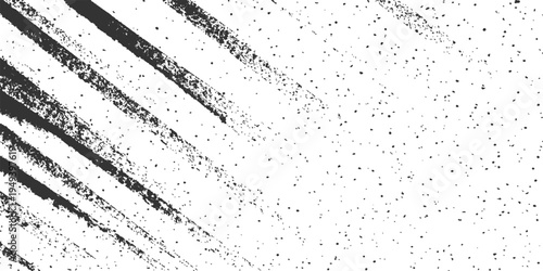 Abstract texture design of a rough surface composed of diagonal streaks and scattered particles. 