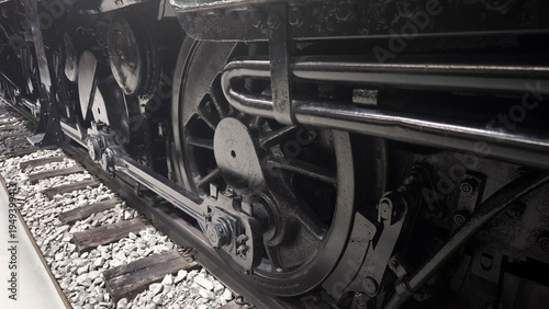 Принти на полотні Close up of the driving wheels and mechanical rods of a black BR 41 steam locomotive