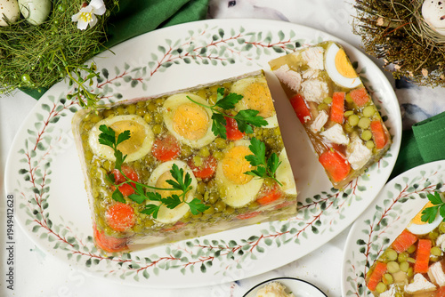 Easter aspic with chicken, eggs, carrots, and peas. A traditional Polish appetizer .top veiw