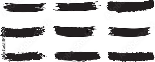 A collection of nine black brush strokes on a white background for design and artistic use