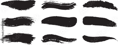 Collection of black brush strokes on white background for artistic and design purposes