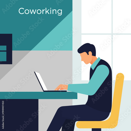 Man working on laptop in coworking space, focused on his task.