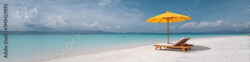Tropical beach with yellow umbrella and lounge chairs on white sand by turquoise water calm seascape horizon for relaxation and vacation