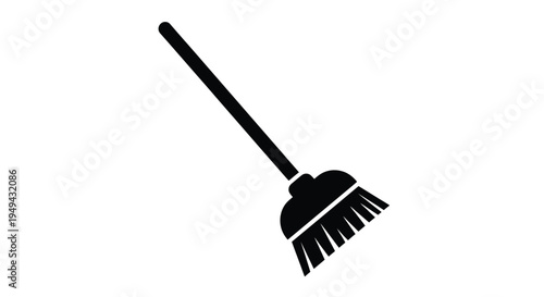 Simple black silhouette of a household broom leaning to the right