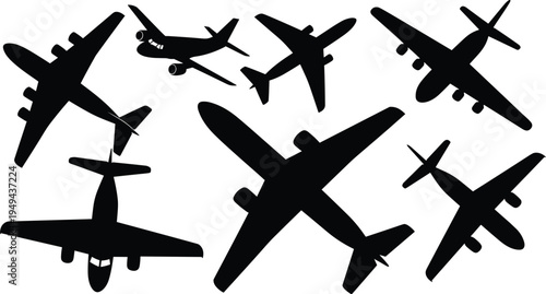 Black silhouettes of various airplanes on white background aircraft