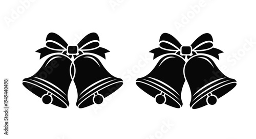 Two black silhouette christmas bells with decorative bows displayed closely