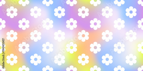Seamless pastel floral pattern with small white flowers over a soft blurred background in pink, blue, yellow, and lavender. Dreamy repeating texture with a light airy spring feel and soft gradient glo