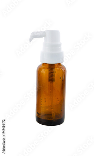 Clear amber glass spray bottle on white.