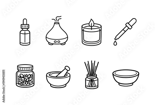 DIY home aromatherapy: essential oil bottle, diffuser device, soy wax candle, dropper pipette, aroma blend jar, small mortar and pestle, reed sticks, ceramic bowl