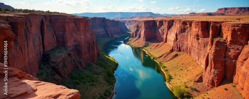 Majestic Colorado River carving its path through the breathtaking sandstone canyons of the American Southwest A stunning display of nature's power and artistry , daytime, water, panorama