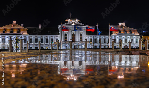 Photography Presidential Palace Bratislava at night with illuminated facade reflection