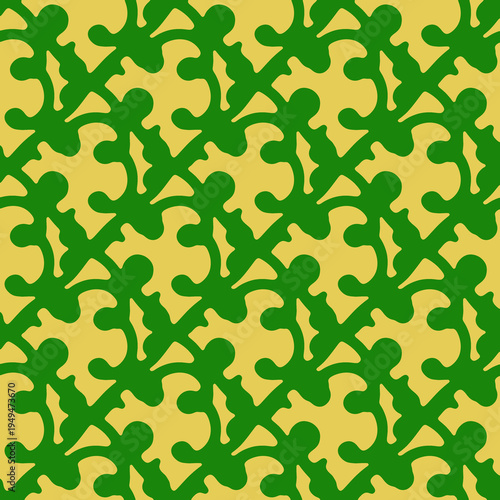 Seamless organic abstract pattern with green amoeba shapes on warm yellow background. Playful retro repeating design ideal for textiles, wallpapers, packaging and modern surface design.