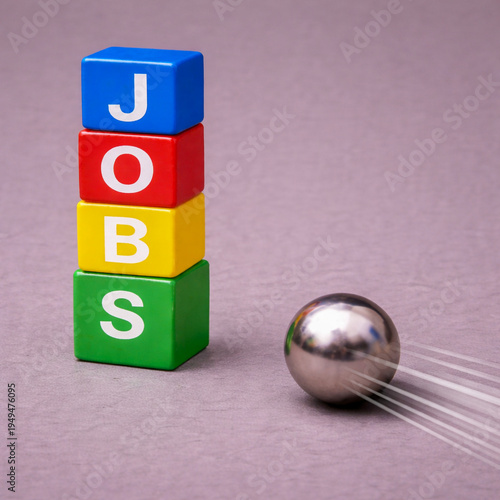 a symbolic economic scene made with colorful letter cubes.  companies are cutting jobs, Companies reducing workforce
Economic slowdown affecting employment
