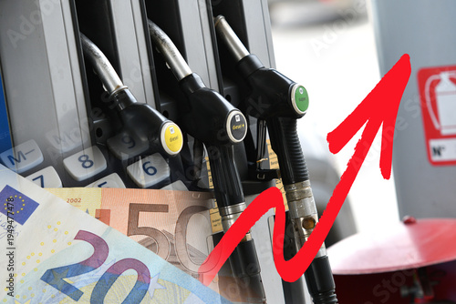 Gas pumps at a gas station with euro banknotes. Rising prices. Concept of rising gasoline and diesel prices due to the war in the Middle East.