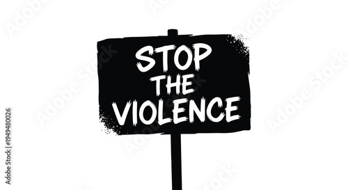 A black sign with white text reading stop the violence is displayed