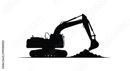 Silhouette of a heavy excavator digging into a mound of earth