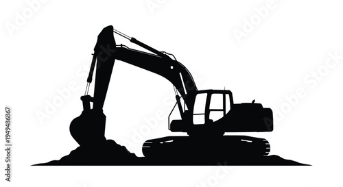 Black silhouette of an excavator digging in a mound of earth