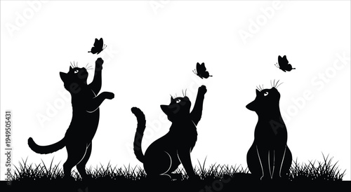 A playful scene of three cats reaching for fluttering butterflies in a grassy field