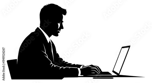 Silhouette of a businessman working on a laptop computer at a desk, black and white.