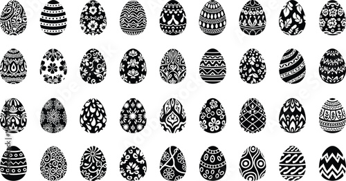 Collection of black and white decorated Easter eggs with various patterns