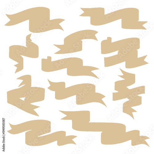 Various ribbons are scattered on a white surface in a messy arrangement.