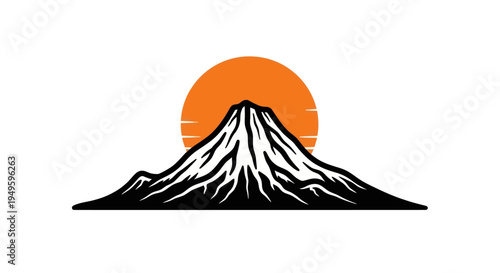 Mountain silhouette against rising sun