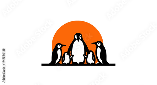 Penguin family silhouette against orange sunset