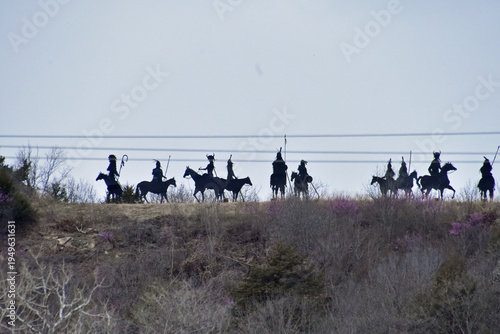 Native American Silhouettes on a Hill