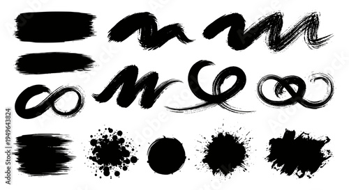 Collection of various black ink brush strokes and paint splatters.