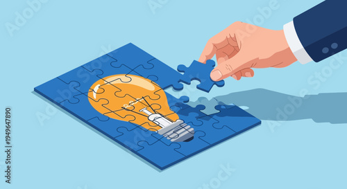 Hand placing puzzle piece light bulb.