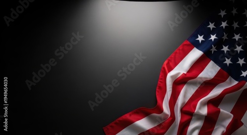 Waving american flag on black background, patriotic and solemn mood