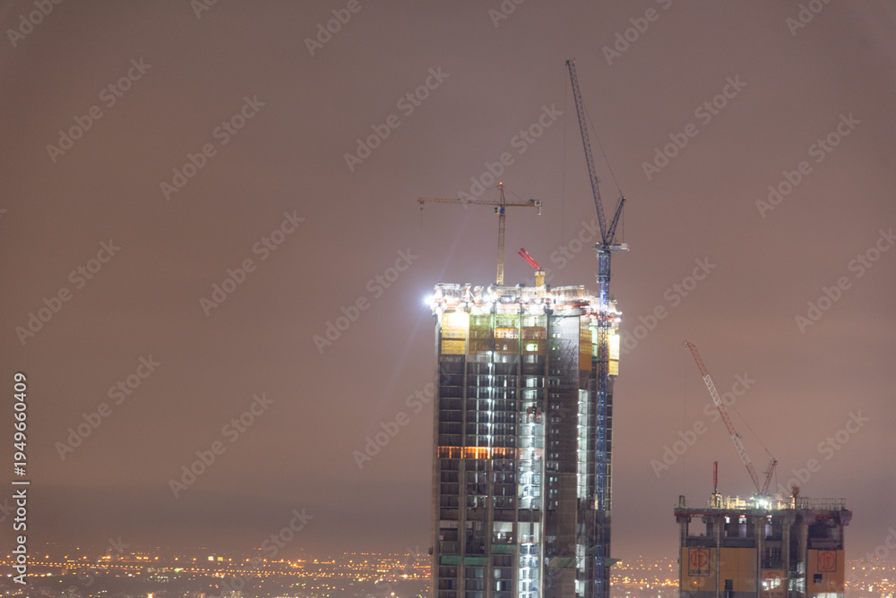 Fototapeta premium City twilight Amazing cityscape light. Panorama view of Bangkok city skyline night time sunset sky. Beautiful skyscraper midtown landscape. Capital building background modern office district