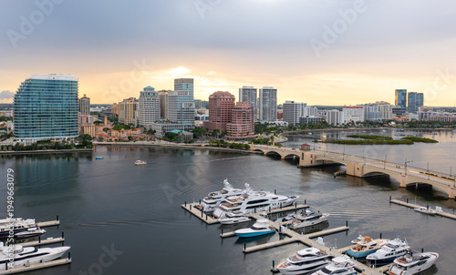 West Palm Beach Skyline and Royal Park Bridge at Sunset Grey and Yellow sky tones.