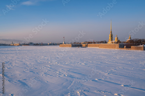 Peter and Paul Fortress and Vasilievsky Island from the Trinity Bridge over the Neva River on a sunny winter morning, St. Petersburg, Russia