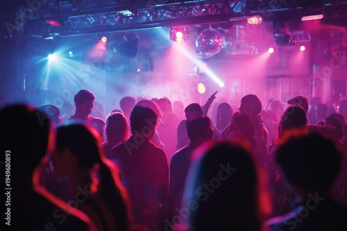 Crowd of young people dancing at a nightclub