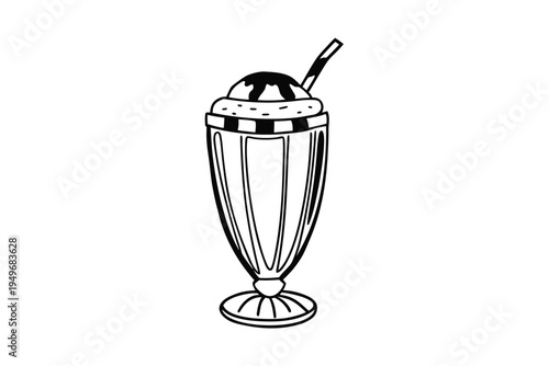 Classic milkshake in a tall glass with a straw.