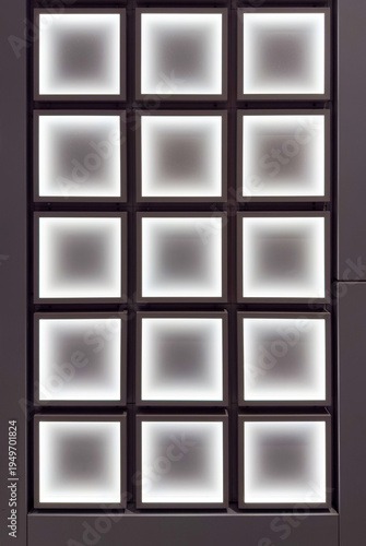 Modern Minimalist Design with Illuminated Squares Creating a Captivating Pattern