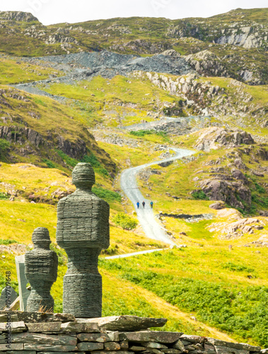 Human like figures, built atop walls of slate,overlooking the Honister Pass,Cumbria,Lake District,England,UK.