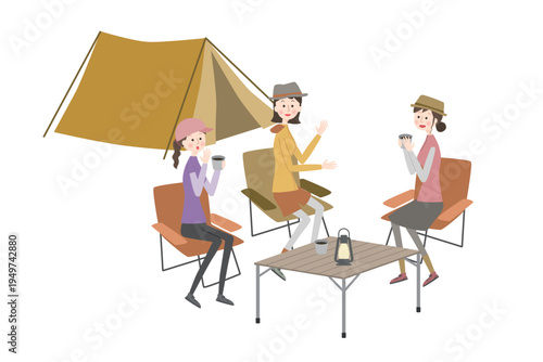 キャンプ場で座って会話している女性たち