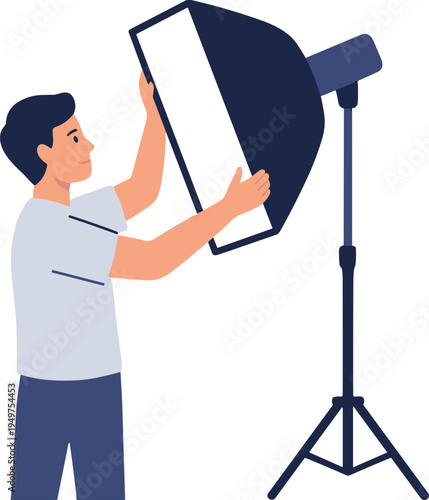 A man adjusts a large reflector panel on a stand indoors.