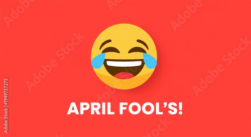 Laughing face emoji with tears on red background and april fool's text
