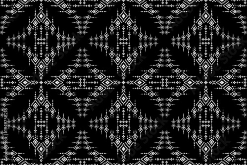 Modern black and white ikat diamond pattern. Seamless geometric tribal ornament for luxury textile design and graphic background.CMYK